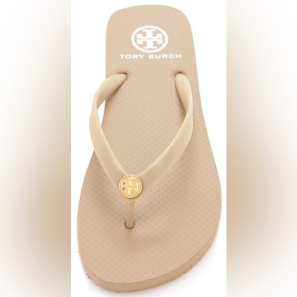 Tory Burch Shoes - Tory Burch Tan Flip Flops with Gold Emblem